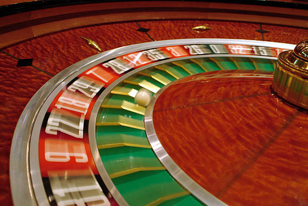 Live dealer managing a dice game table with real-time results on screen