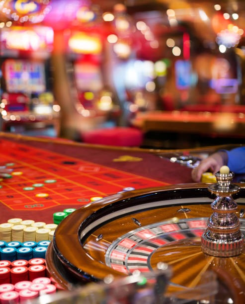 Dream Catcher spinning wheel with coloured segments and live dealer studio setup